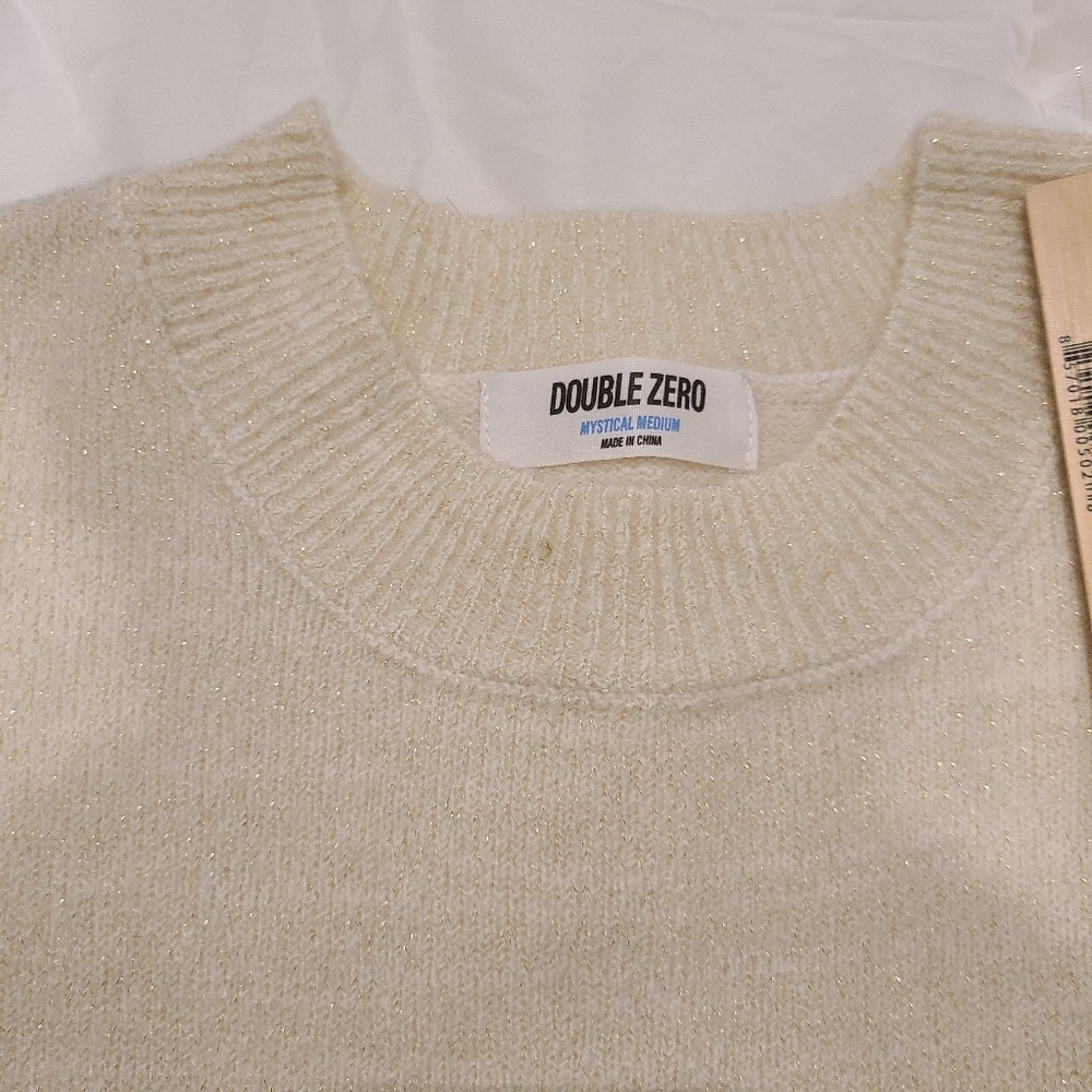 Cream sweater with gold speckle